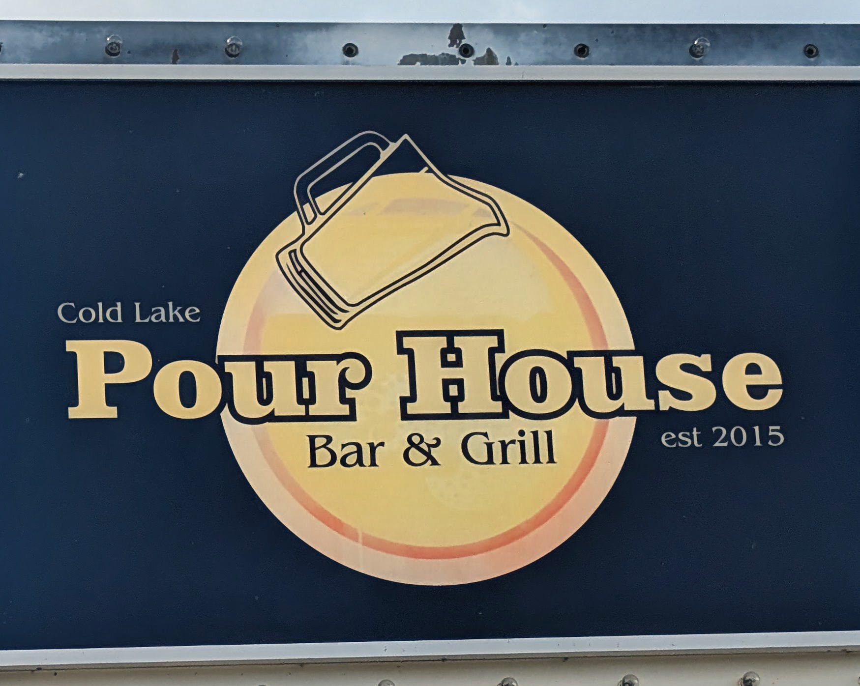 PourHouse Bar & Grill exterior sign, established 2015